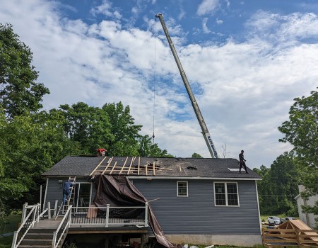 crane construction roofing project
